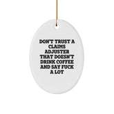 Funny Claims Adjuster Gifts from Friends, Christmas Unique Oval Ornaments for the Claims Adjuster Who Says 'F--k A Lot' Over Coffee, White Oval Shaped Figurine - Image 1